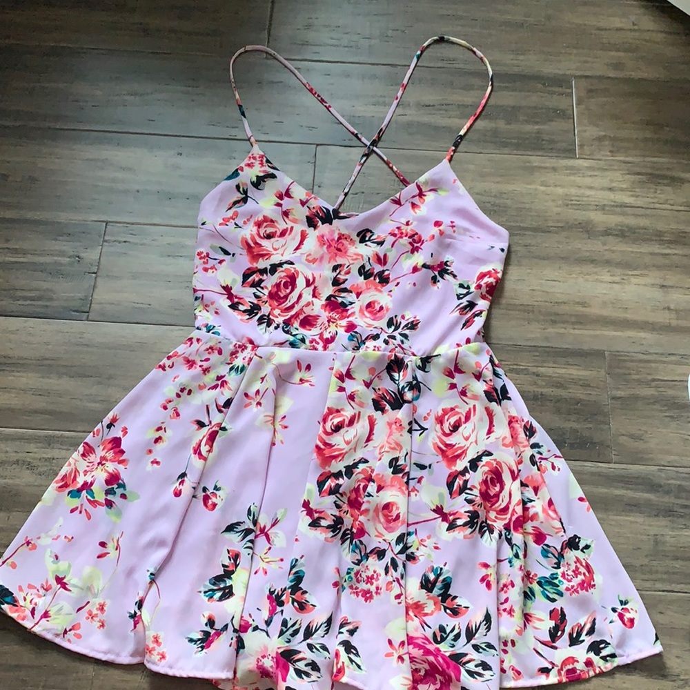 Floral Express Romper with open back size 4